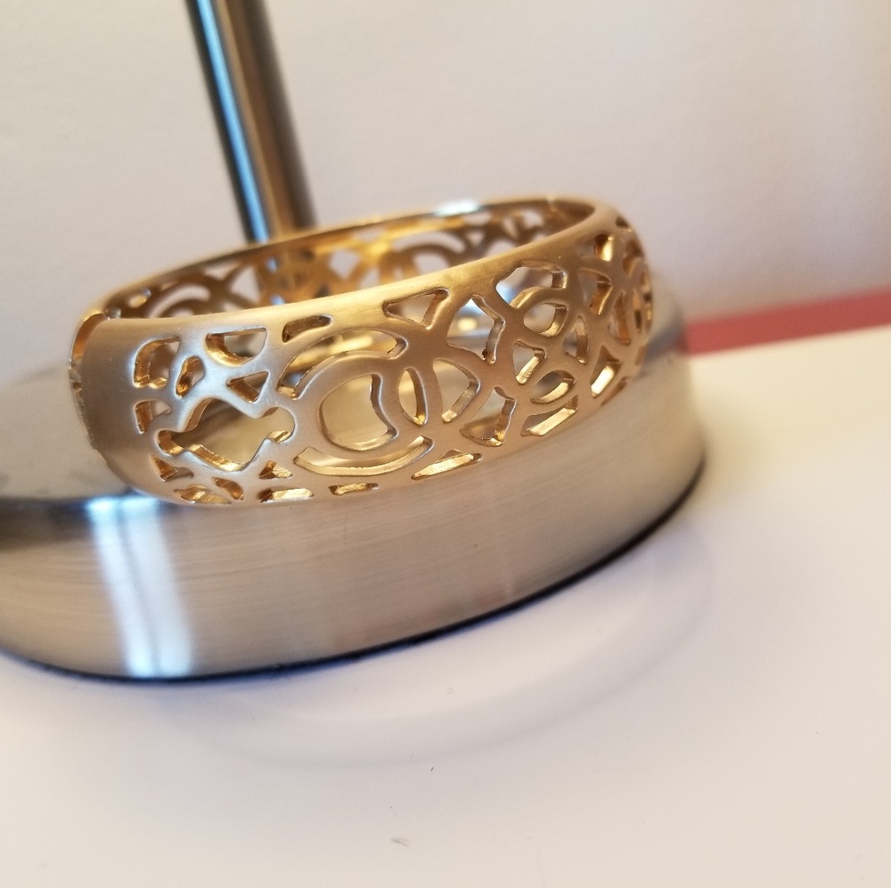 Brushed gold tone bangle bracelet
